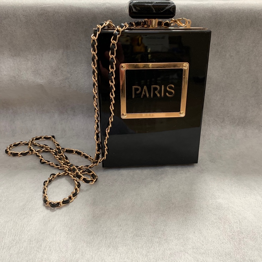 Rare to find. PARIS bottle chain sling